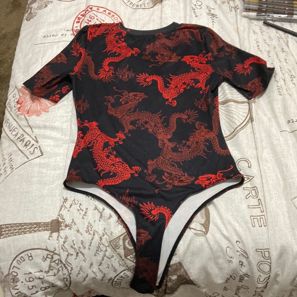 Bodysuit from shien, black with red dragons.
